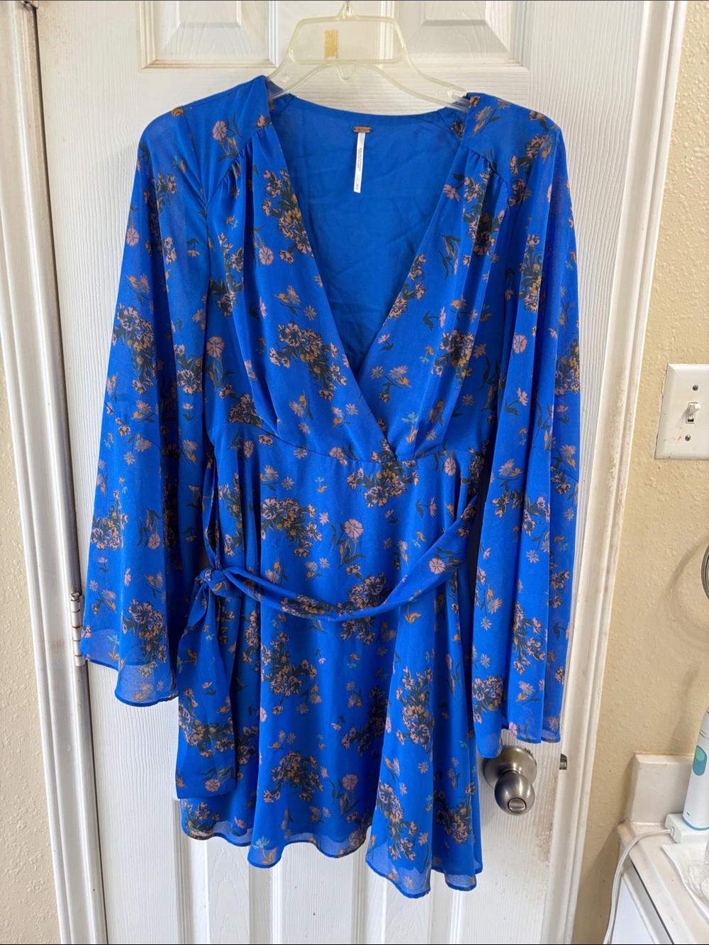 Free people cobalt fully lined Blue Floral Wrap Dress with Tie Waist. EUC